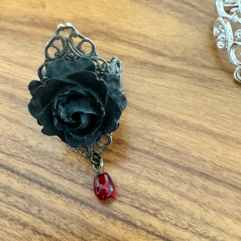 Ring black rose with red drop